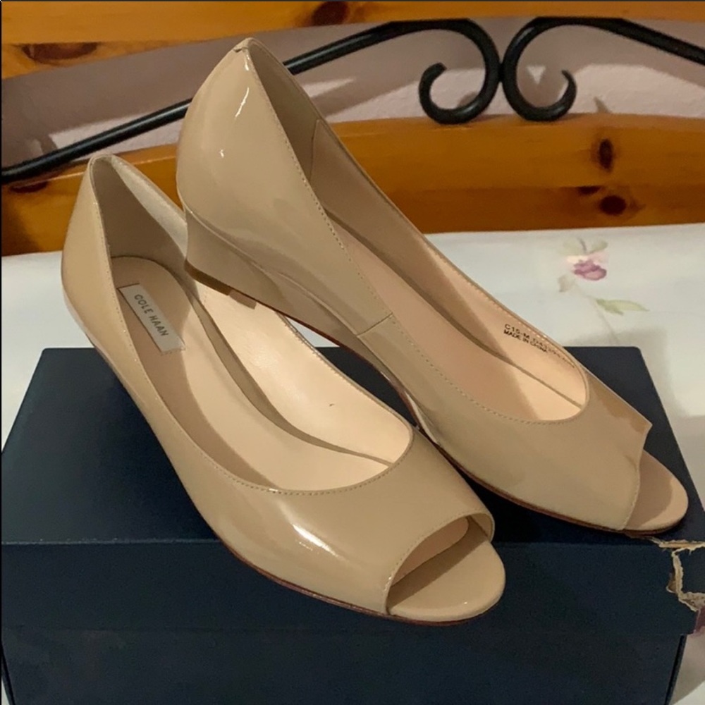 New COLE HAAN nude patent peep toe wedges